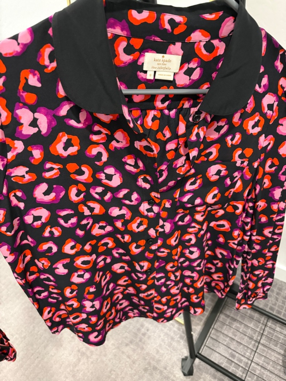 kate spade black blouse with pink and red leopard print